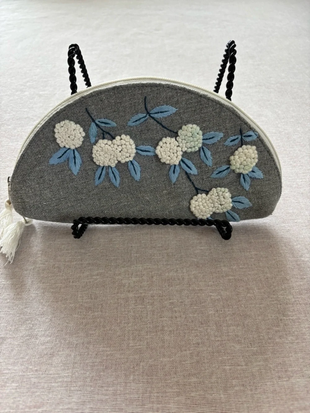 Grey embroidered floral half moon whimsical coquette clutch bag.
